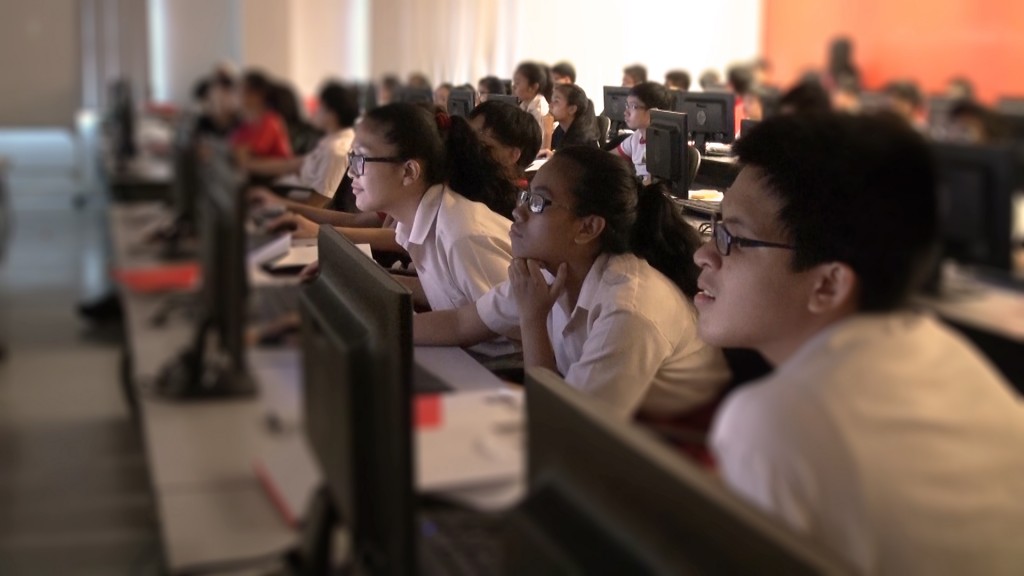 5 July 2014, students from Bedok North Secondary School working on their game designs in an experiential workshop at DigiPen Institute of Technology Singapore. Photo | SIT Royson Poh
