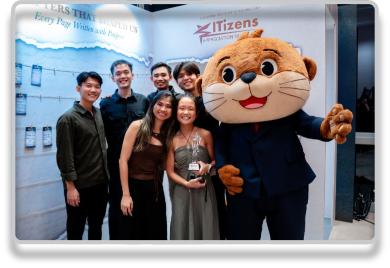 SITizens with the SIT mascot at an awards ceremony