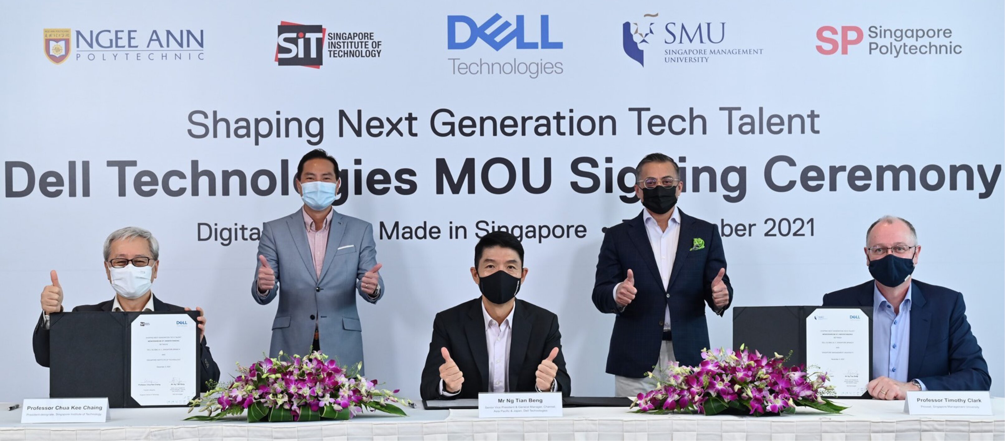 Representatives from Dell Technologies and Institutes of Higher Learning signing the MOU (seated, from left): Prof Chua Kee Chaing, SIT President; Mr Ng Tian Beng, Senior Vice President & General Manager, Channel, Asia Pacific & Japan, Dell Technologies; and Prof Timothy Clark, Provost, Singapore Management University. The signing ceremony was witnessed by (standing, from left): Mr Tan Kiat How, Senior Minister of State, Ministry of Communications & Information and Ministry of National Development; and Mr Amit Midha, President, Asia Pacific & Japan, and Global Digital Cities, Dell Technologies. (Photo courtesy of Dell Technologies)