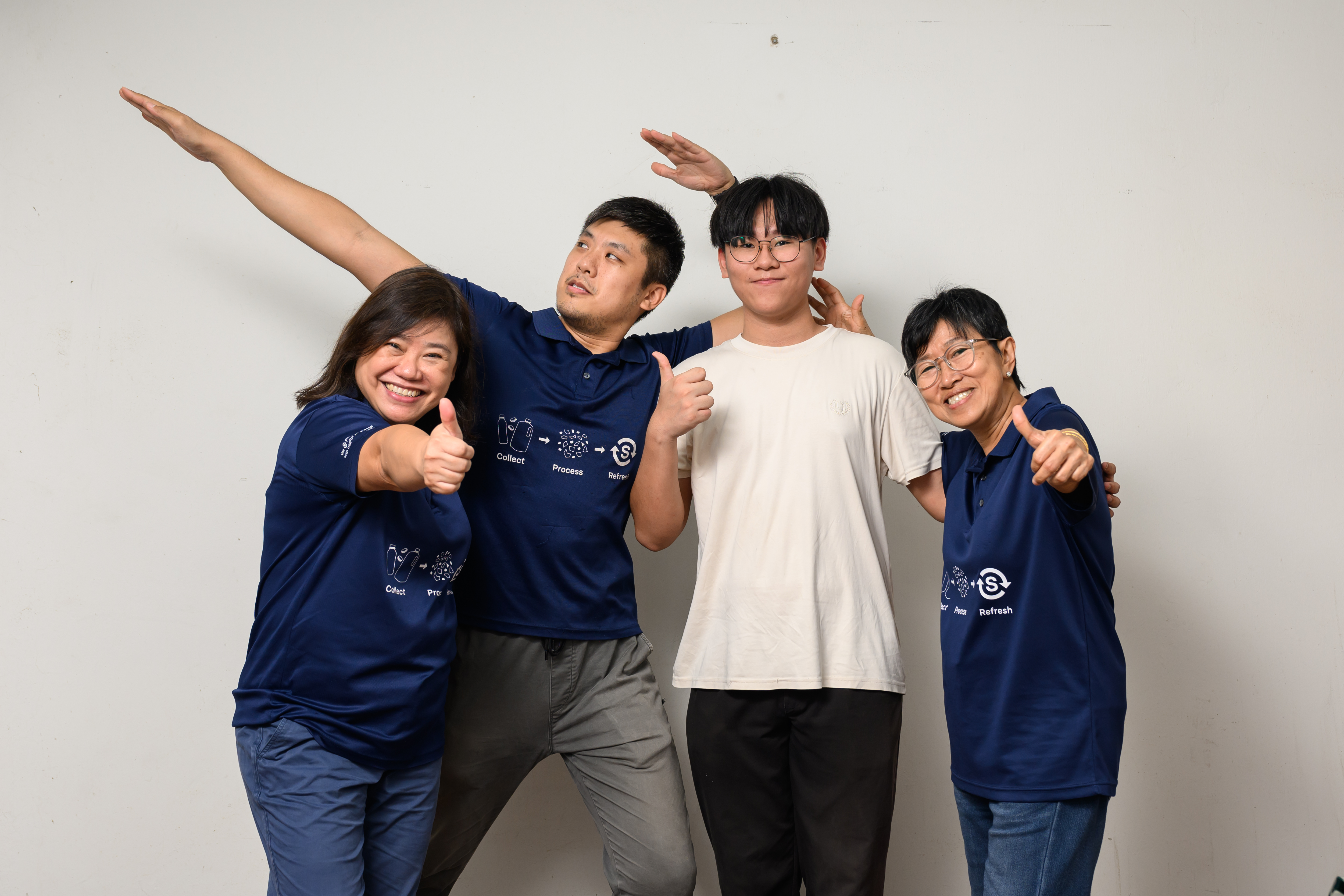 Jeryl (second from the left) sharing a moment of camaraderie and achievement with his colleagues. (Photo: Jeryl Yep)