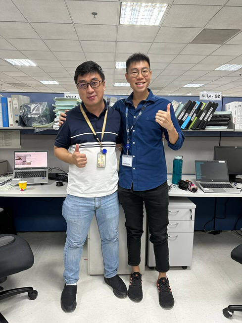 Zhang Xu with Industrial Supervisor Ang Yong Cheong