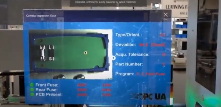 A digital interface showing "Camera Inspection Data" for a green circuit board. The screen displays a top-down image of the part along with technical metrics such as deviation, part number, and fuse presence indicators.