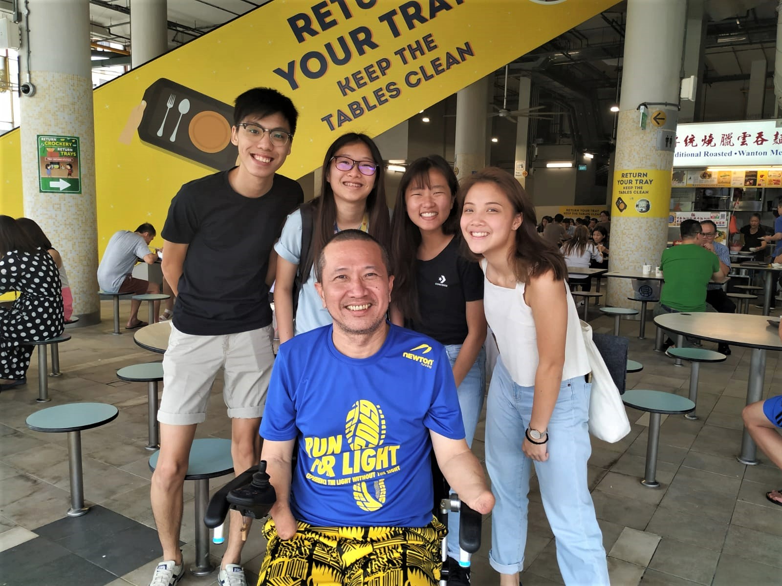 hawker centre with students Mr Tan