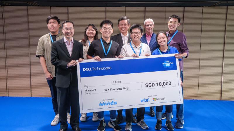 The winning team from SIT with Education Minister Chan Chun Sing and representatives from Dell Technologies and MINDS (Photo: Dell Technologies) 