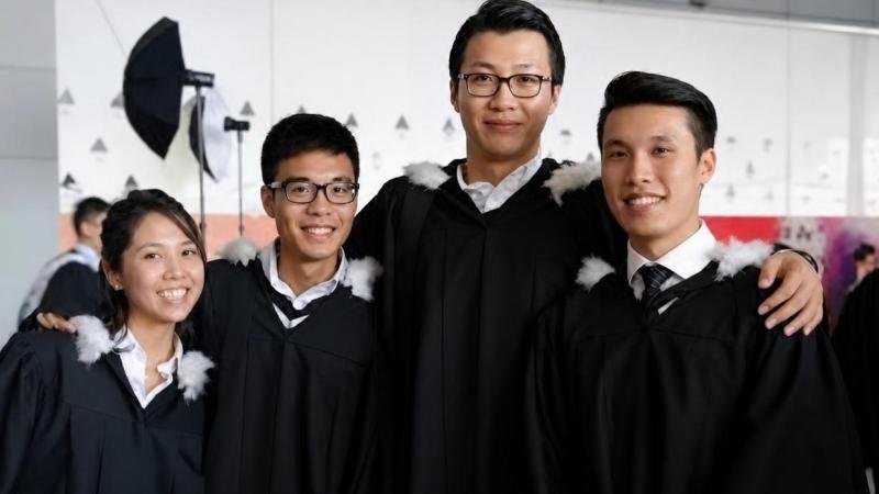 Jian Ming with his classmates on graduation day