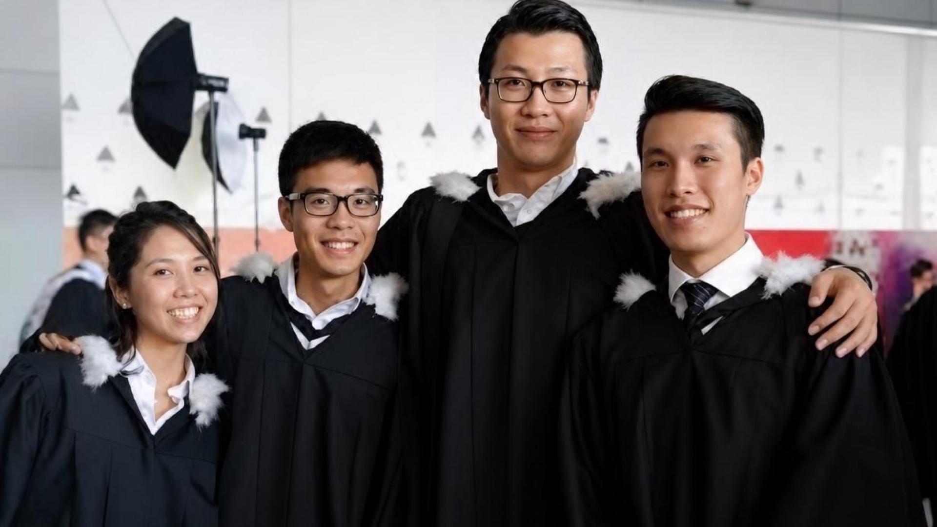 Jian Ming with his classmates on graduation day